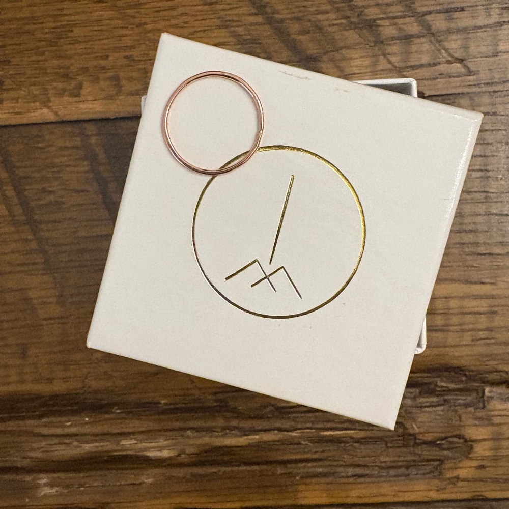 Consider the Wldflwrs rose gold stacking band